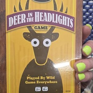 Yellow‎ and Brown Deer Headlights Board Game Adventure